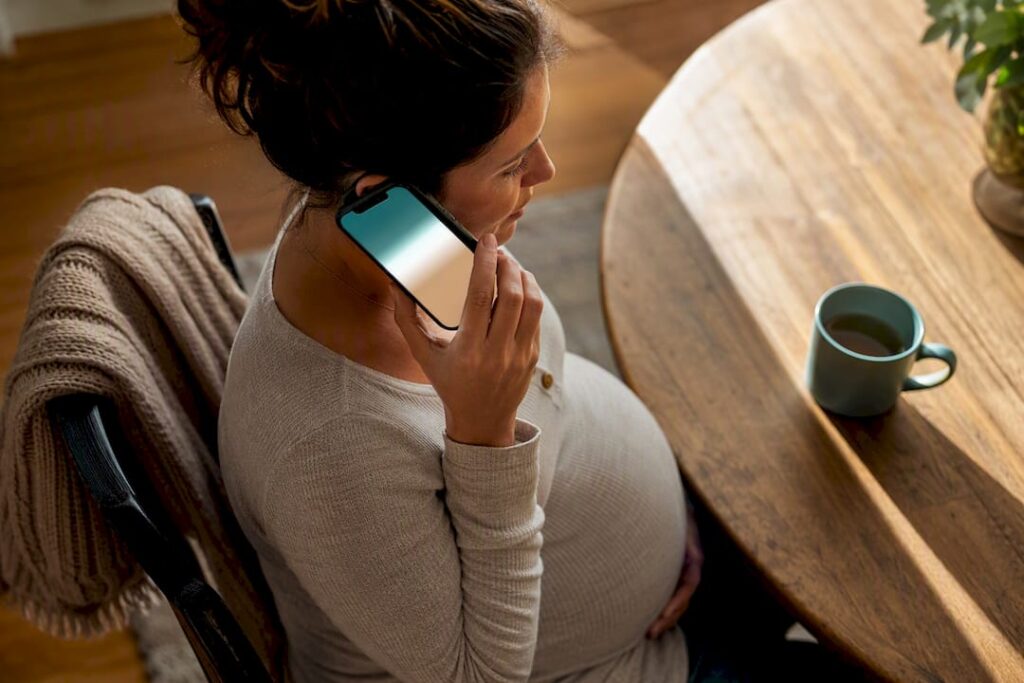 Expectant parent calling a birth resource line