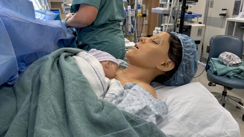 Newborn resting on parent's chest after cesarean
